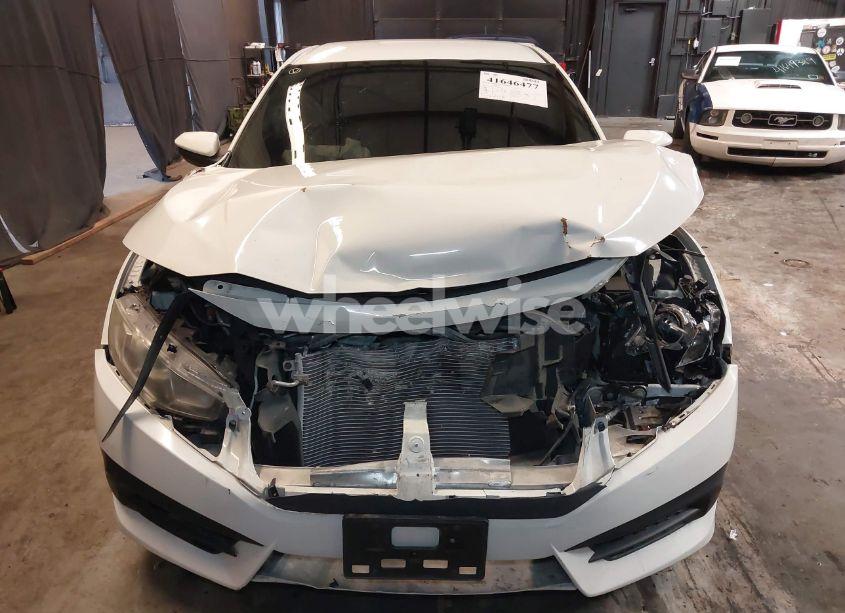 Photo 6 of 2017 Honda Civic LX (VIN 2HGFC2F5XHH524829)