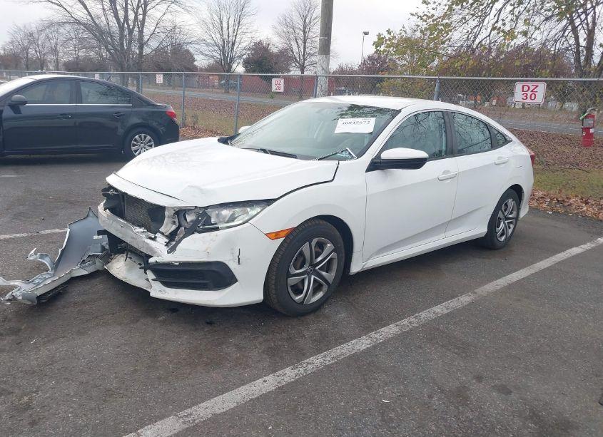 Photo 2 of 2017 Honda Civic LX (VIN 2HGFC2F5XHH528069)
