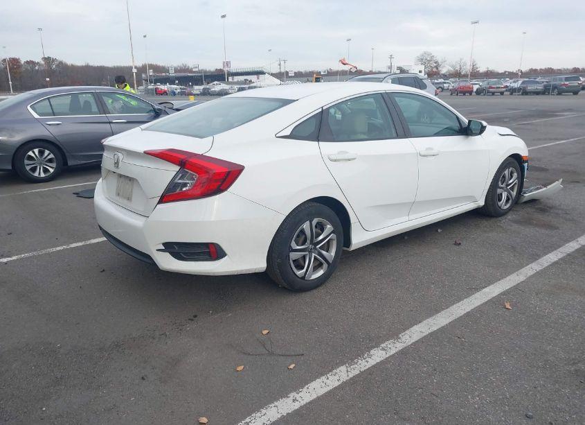 Photo 4 of 2017 Honda Civic LX (VIN 2HGFC2F5XHH528069)