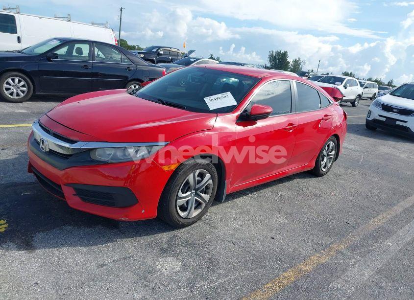 Photo 2 of 2017 Honda Civic LX (VIN 2HGFC2F5XHH532400)