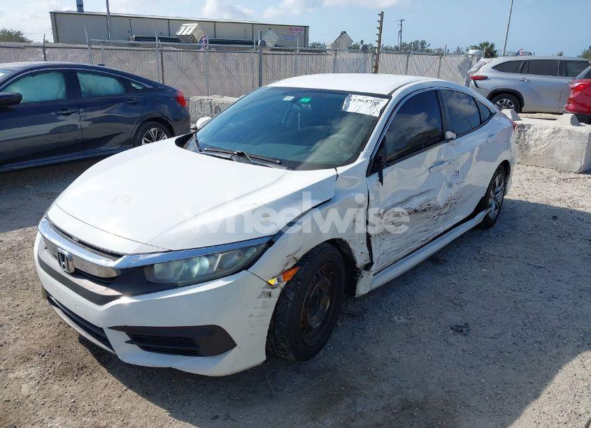 Photo 2 of 2017 Honda Civic LX (VIN 2HGFC2F5XHH543476)