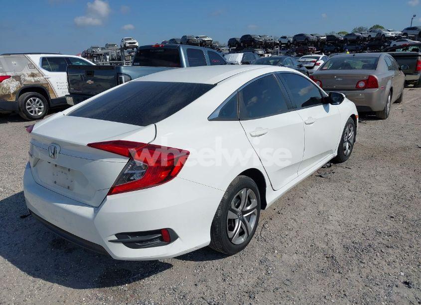Photo 4 of 2017 Honda Civic LX (VIN 2HGFC2F5XHH543476)