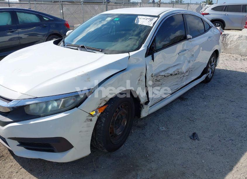 Photo 6 of 2017 Honda Civic LX (VIN 2HGFC2F5XHH543476)