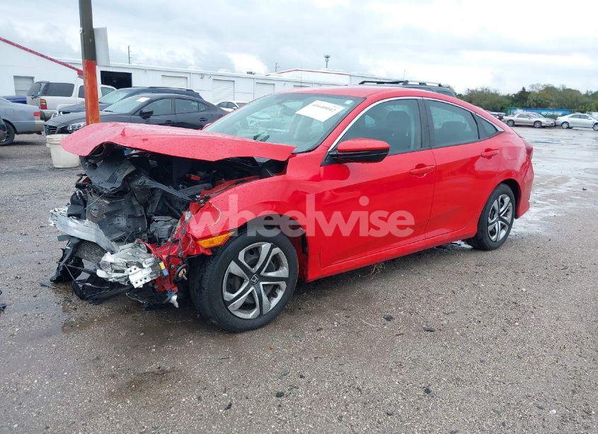 Photo 2 of 2017 Honda Civic LX (VIN 2HGFC2F5XHH562898)
