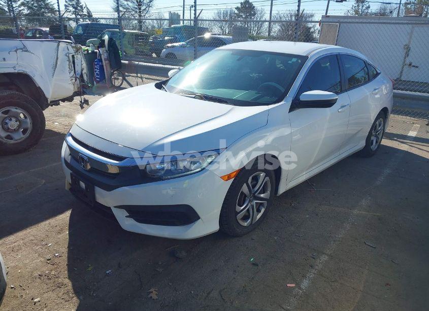 Photo 2 of 2017 Honda Civic LX (VIN 2HGFC2F5XHH569625)