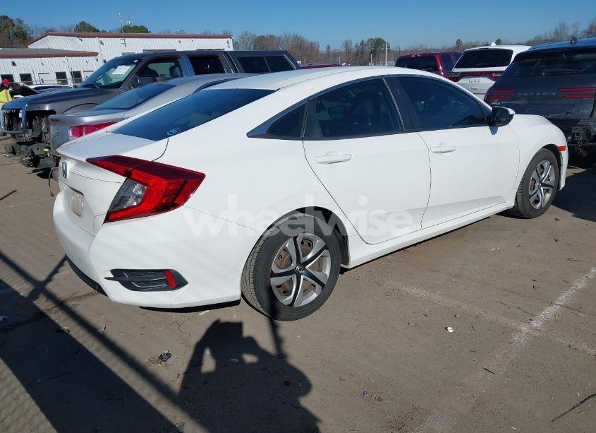 Photo 4 of 2017 Honda Civic LX (VIN 2HGFC2F5XHH569625)