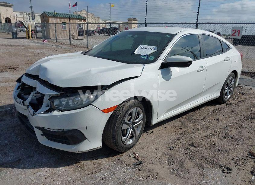 Photo 2 of 2018 Honda Civic LX (VIN 2HGFC2F5XJH502402)