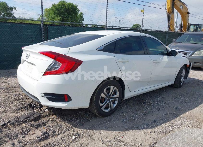 Photo 4 of 2018 Honda Civic LX (VIN 2HGFC2F5XJH502402)