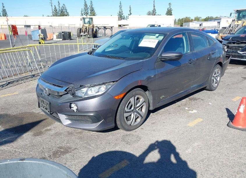 Photo 2 of 2018 Honda Civic LX (VIN 2HGFC2F5XJH518552)