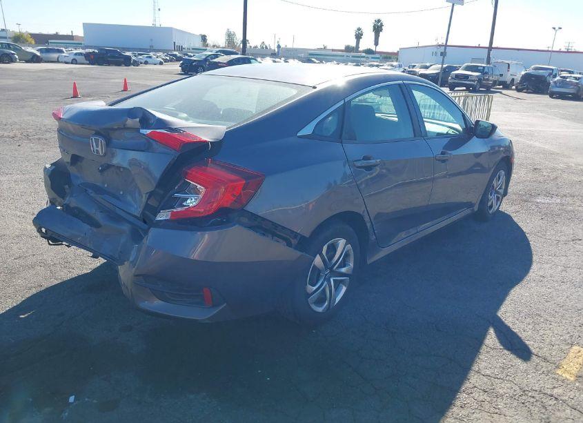 Photo 4 of 2018 Honda Civic LX (VIN 2HGFC2F5XJH518552)