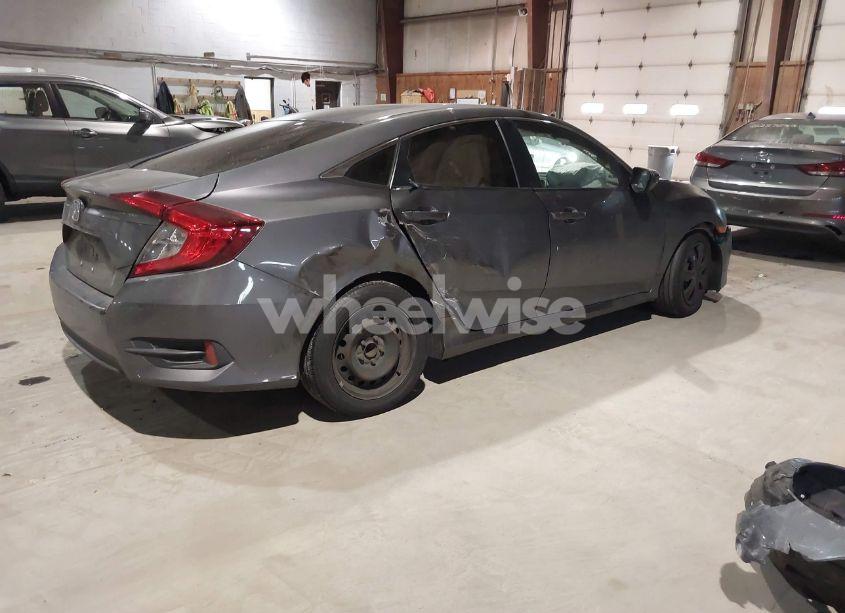 Photo 4 of 2018 Honda Civic LX (VIN 2HGFC2F5XJH520527)