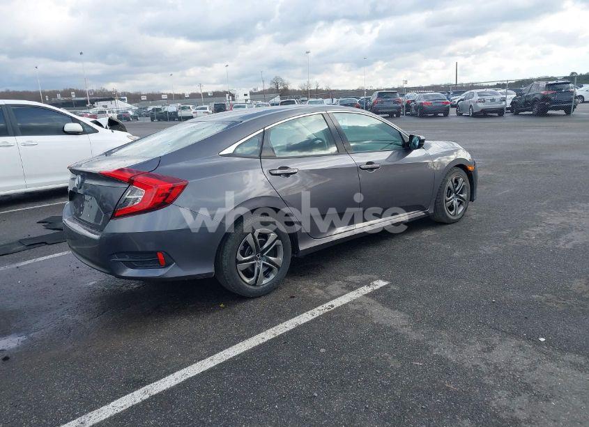 Photo 4 of 2018 Honda Civic LX (VIN 2HGFC2F5XJH526070)