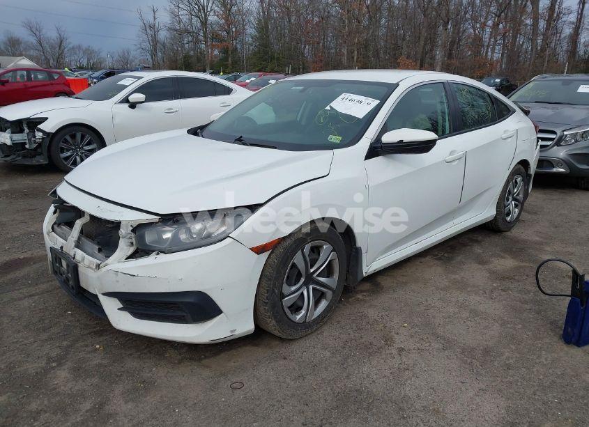 Photo 2 of 2018 Honda Civic LX (VIN 2HGFC2F5XJH540941)