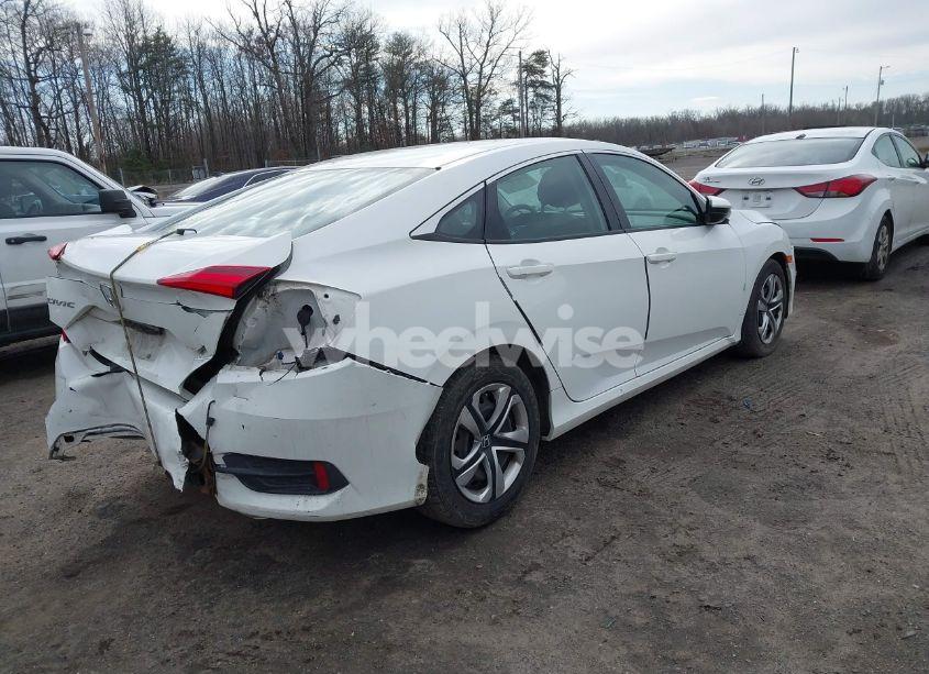 Photo 4 of 2018 Honda Civic LX (VIN 2HGFC2F5XJH540941)