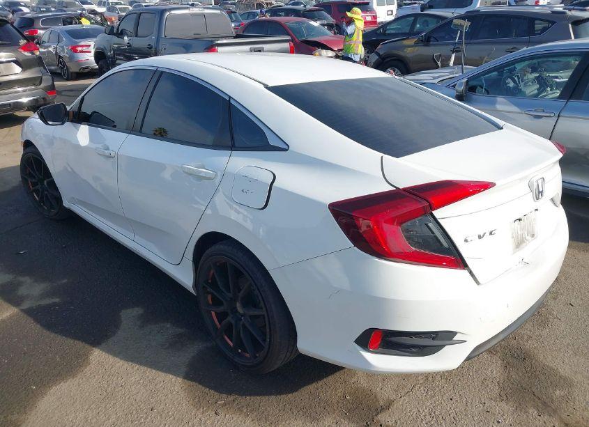 Photo 3 of 2018 Honda Civic LX (VIN 2HGFC2F5XJH555911)