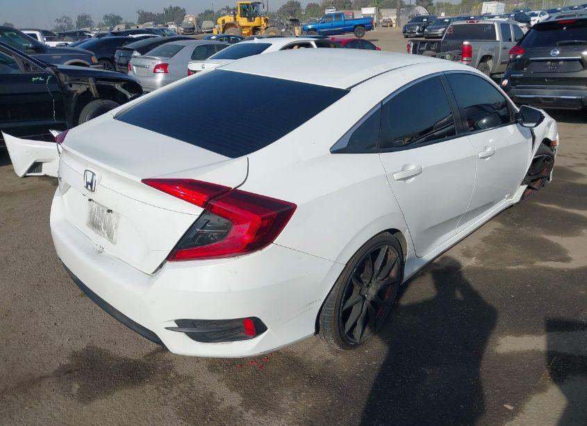 Photo 4 of 2018 Honda Civic LX (VIN 2HGFC2F5XJH555911)