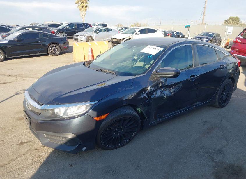 Photo 2 of 2018 Honda Civic LX (VIN 2HGFC2F5XJH559778)
