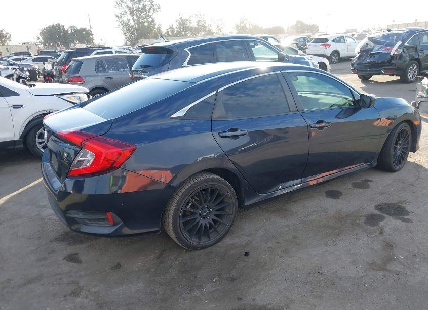 Photo 4 of 2018 Honda Civic LX (VIN 2HGFC2F5XJH559778)