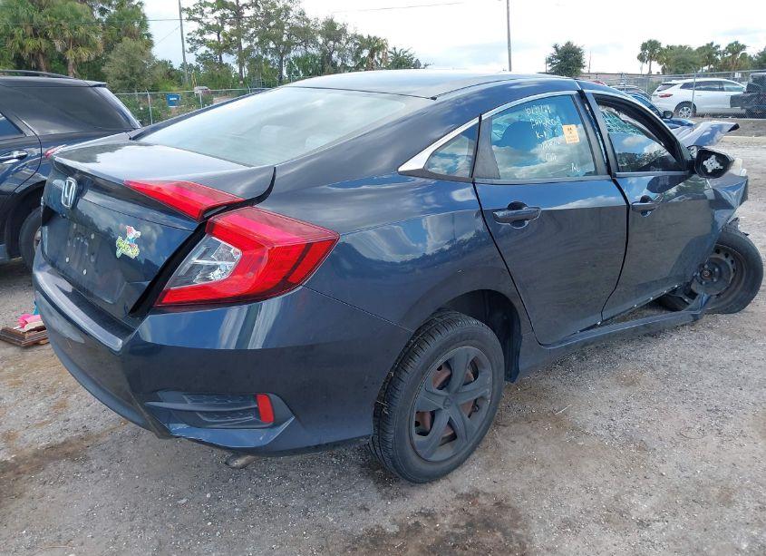 Photo 4 of 2018 Honda Civic LX (VIN 2HGFC2F5XJH564303)