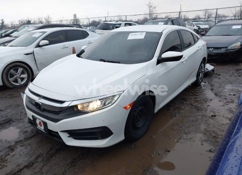 Photo 2 of 2018 Honda Civic LX (VIN 2HGFC2F5XJH566486)