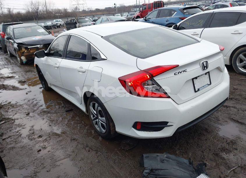 Photo 3 of 2018 Honda Civic LX (VIN 2HGFC2F5XJH566486)