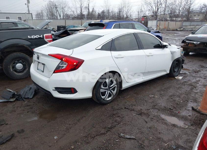 Photo 4 of 2018 Honda Civic LX (VIN 2HGFC2F5XJH566486)