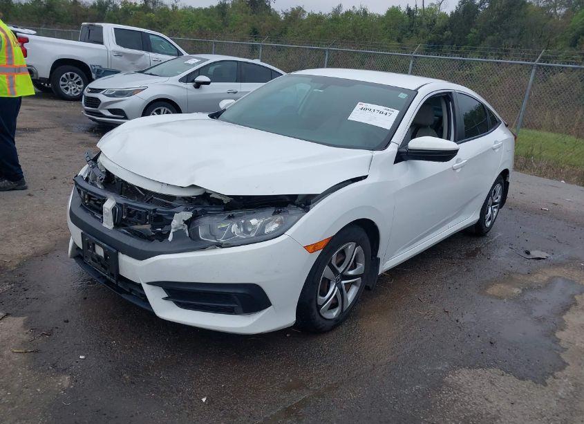 Photo 2 of 2018 Honda Civic LX (VIN 2HGFC2F5XJH582266)