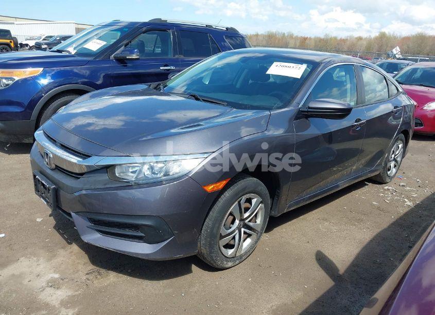Photo 2 of 2018 Honda Civic LX (VIN 2HGFC2F5XJH586527)