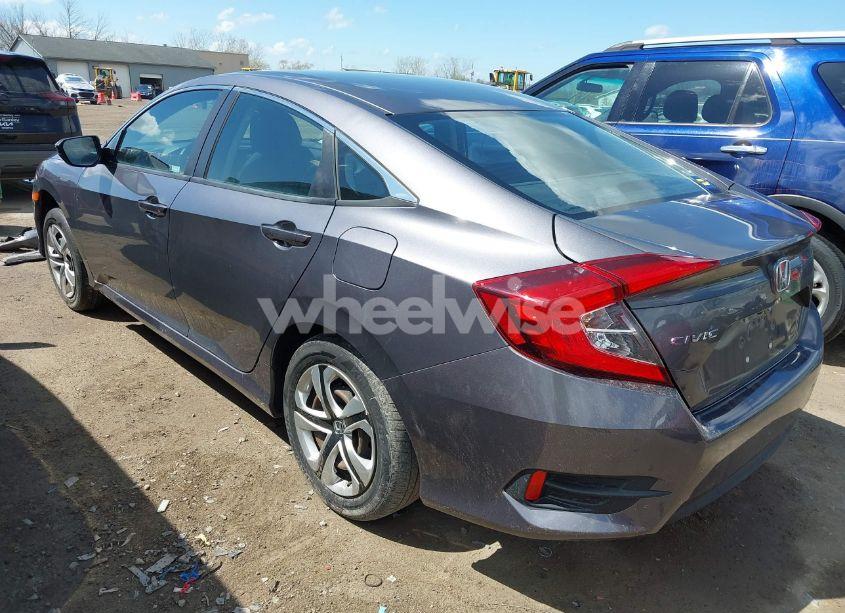 Photo 3 of 2018 Honda Civic LX (VIN 2HGFC2F5XJH586527)