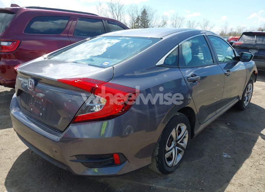 Photo 4 of 2018 Honda Civic LX (VIN 2HGFC2F5XJH586527)