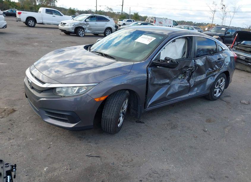 Photo 2 of 2018 Honda Civic LX (VIN 2HGFC2F5XJH593977)