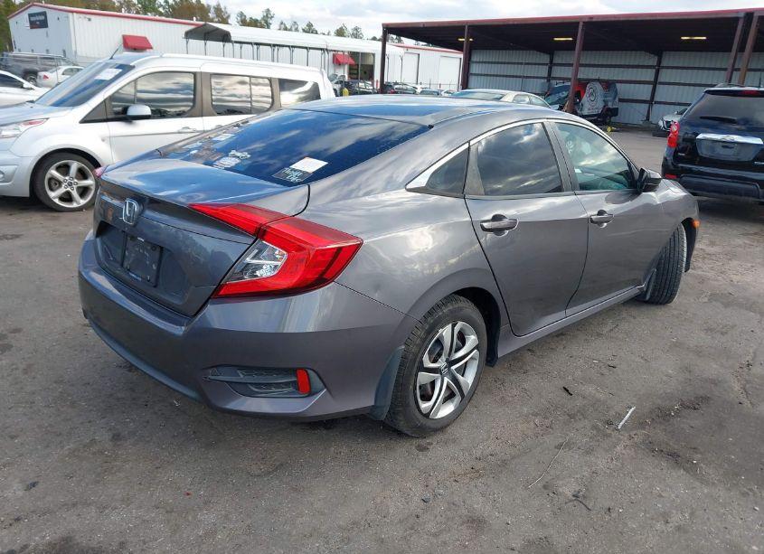 Photo 4 of 2018 Honda Civic LX (VIN 2HGFC2F5XJH593977)
