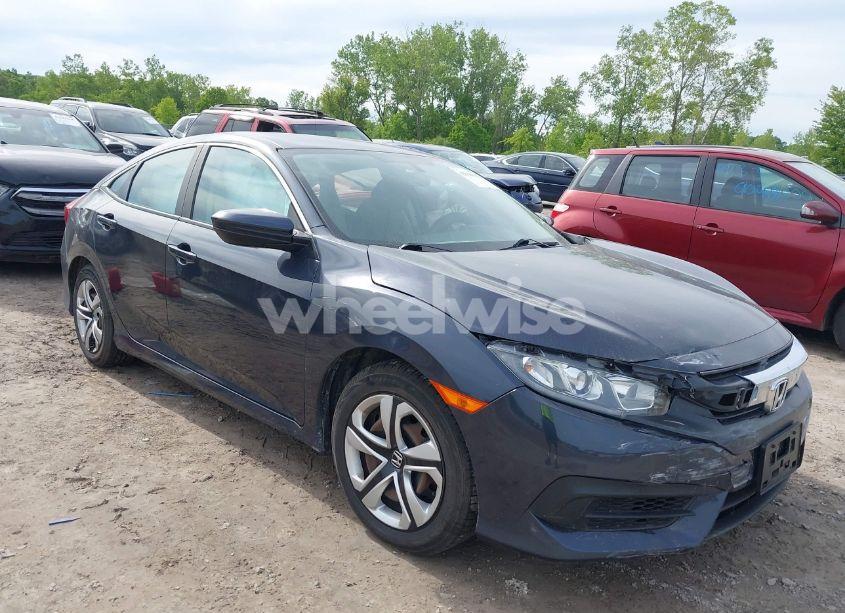 2018 Honda Civic LX (VIN 2HGFC2F5XJH597978) main photo