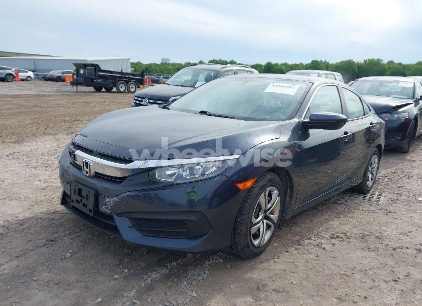 Photo 2 of 2018 Honda Civic LX (VIN 2HGFC2F5XJH597978)