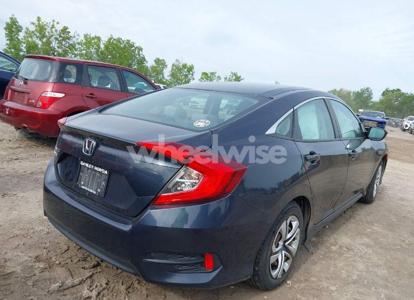 Photo 4 of 2018 Honda Civic LX (VIN 2HGFC2F5XJH597978)