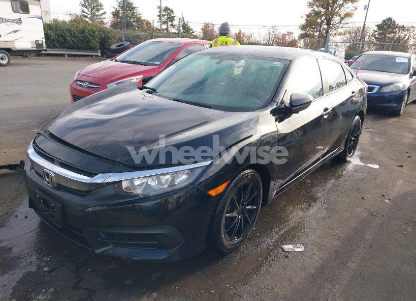 Photo 2 of 2018 Honda Civic LX (VIN 2HGFC2F5XJH602239)