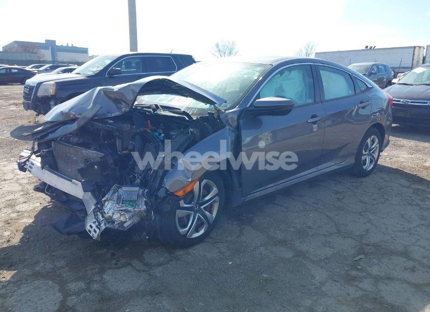 Photo 2 of 2018 Honda Civic LX (VIN 2HGFC2F5XJH602645)