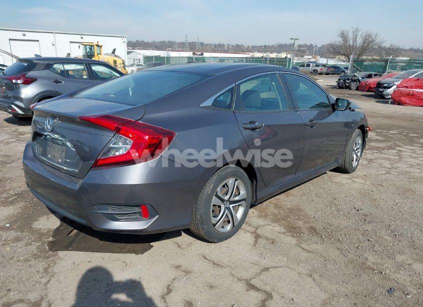 Photo 4 of 2018 Honda Civic LX (VIN 2HGFC2F5XJH602645)