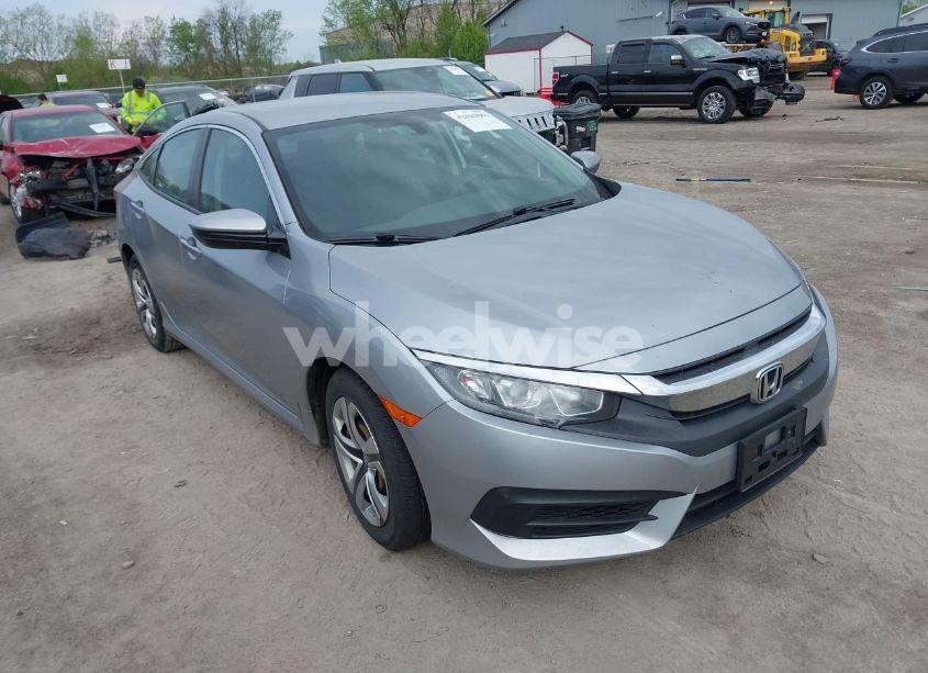 2018 Honda Civic LX (VIN 2HGFC2F5XJH604069) main photo