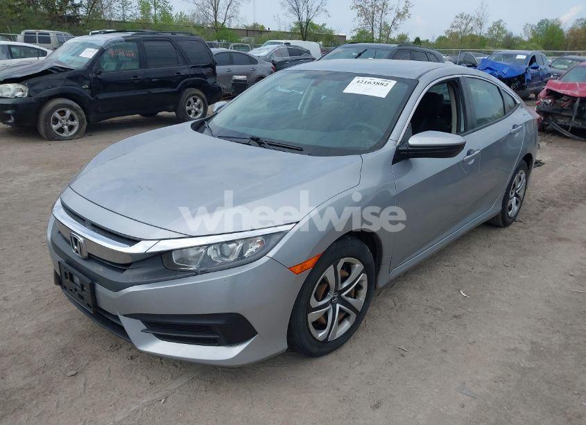 Photo 2 of 2018 Honda Civic LX (VIN 2HGFC2F5XJH604069)