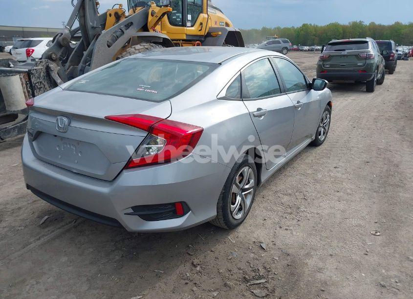 Photo 4 of 2018 Honda Civic LX (VIN 2HGFC2F5XJH604069)