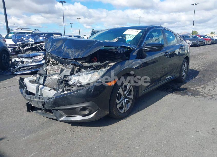 Photo 2 of 2018 Honda Civic LX (VIN 2HGFC2F60JH531478)