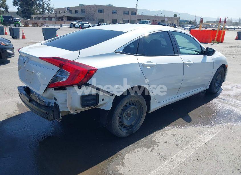 Photo 4 of 2021 Honda Civic LX (VIN 2HGFC2F61MH547922)