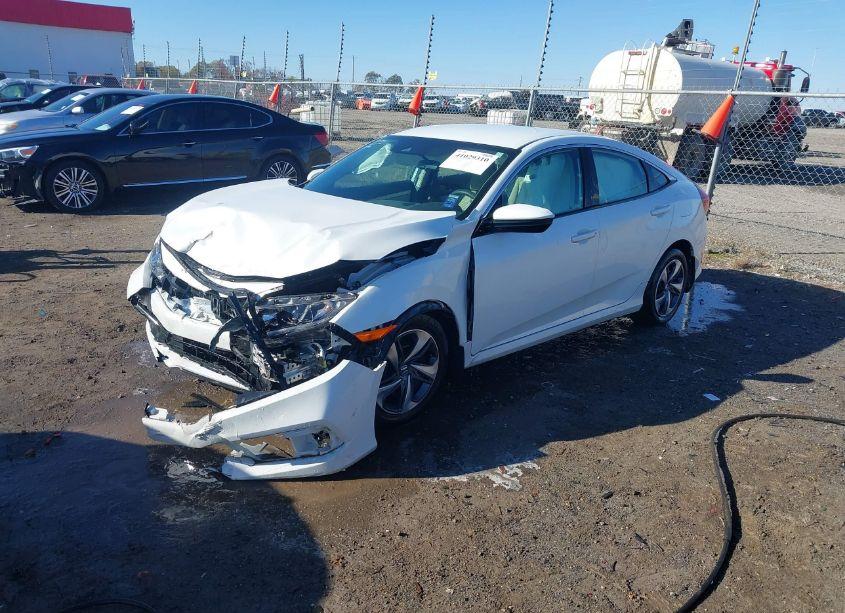 Photo 2 of 2021 Honda Civic LX (VIN 2HGFC2F62MH556256)