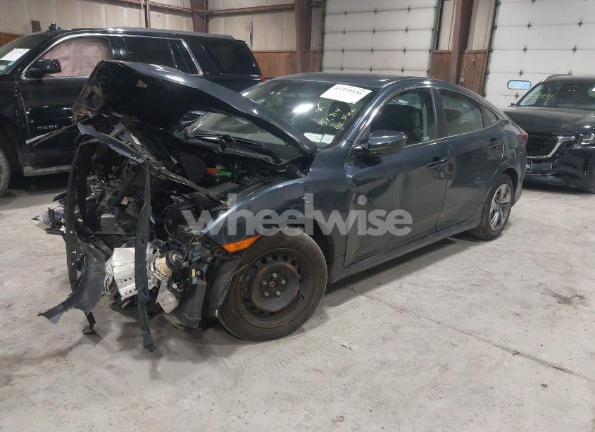 Photo 2 of 2020 Honda Civic LX (VIN 2HGFC2F63LH582427)