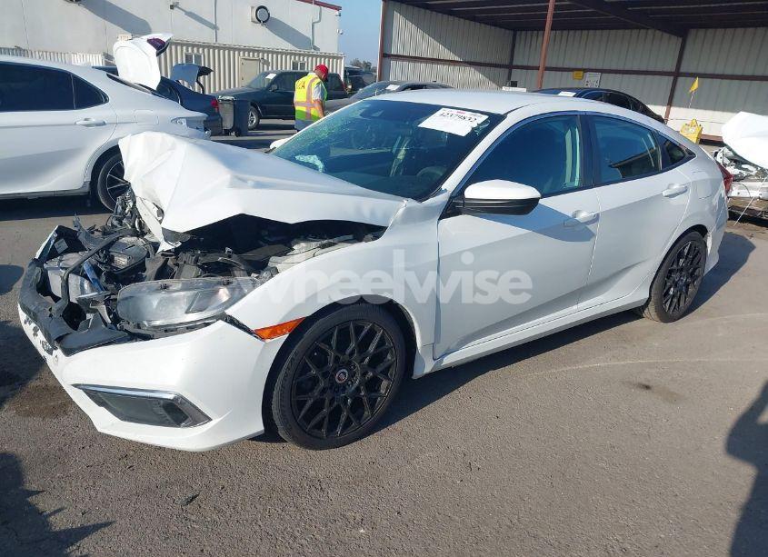 Photo 2 of 2019 Honda Civic LX (VIN 2HGFC2F64KH531937)