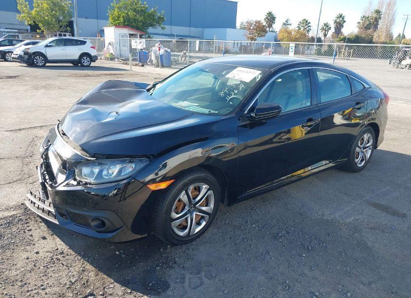 Photo 2 of 2018 Honda Civic LX (VIN 2HGFC2F65JH547868)