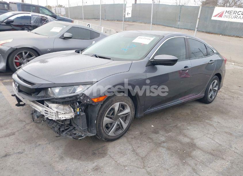 Photo 2 of 2020 Honda Civic LX (VIN 2HGFC2F65LH530359)