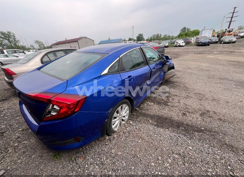 Photo 4 of 2019 Honda Civic LX (VIN 2HGFC2F66KH520311)