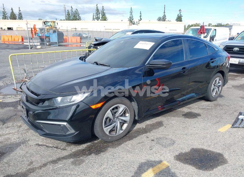 Photo 2 of 2019 Honda Civic LX (VIN 2HGFC2F66KH529493)